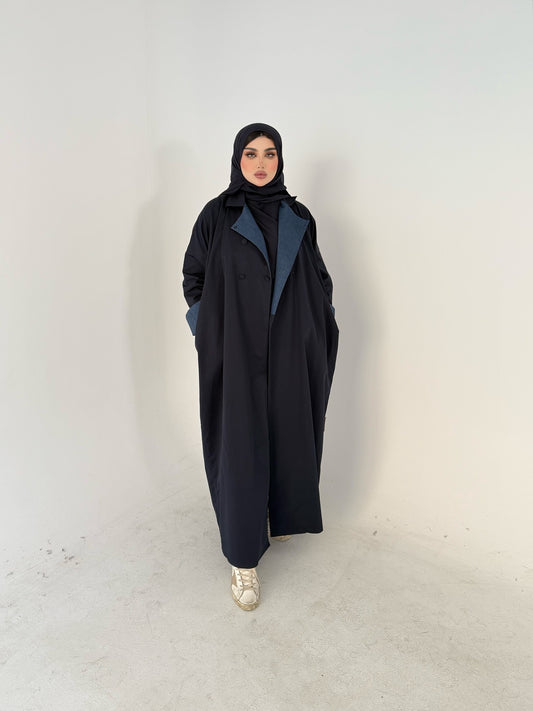 معطف واقٍ من المطر باللون الأزرق الداكن